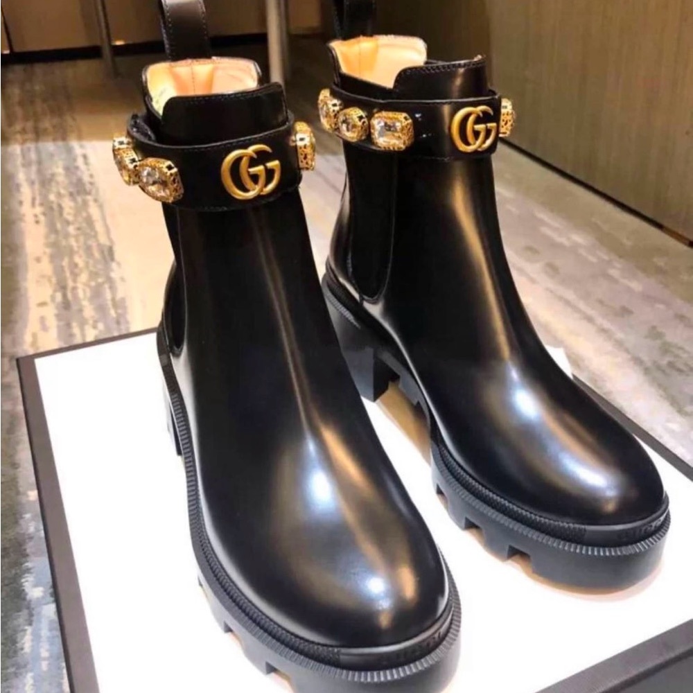 Gucci Black Ankle Boots with Gold Emblem and Thick Sole